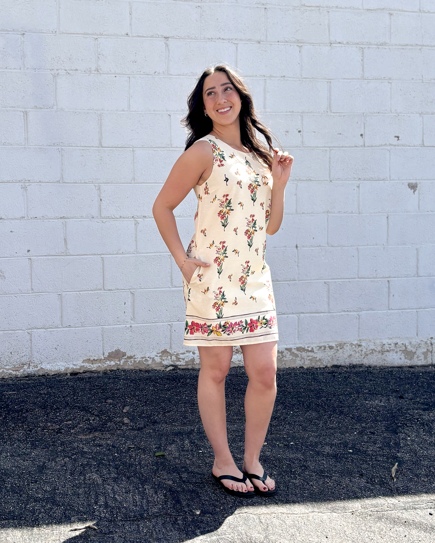 Cute short sleeveless dress with floral pattern