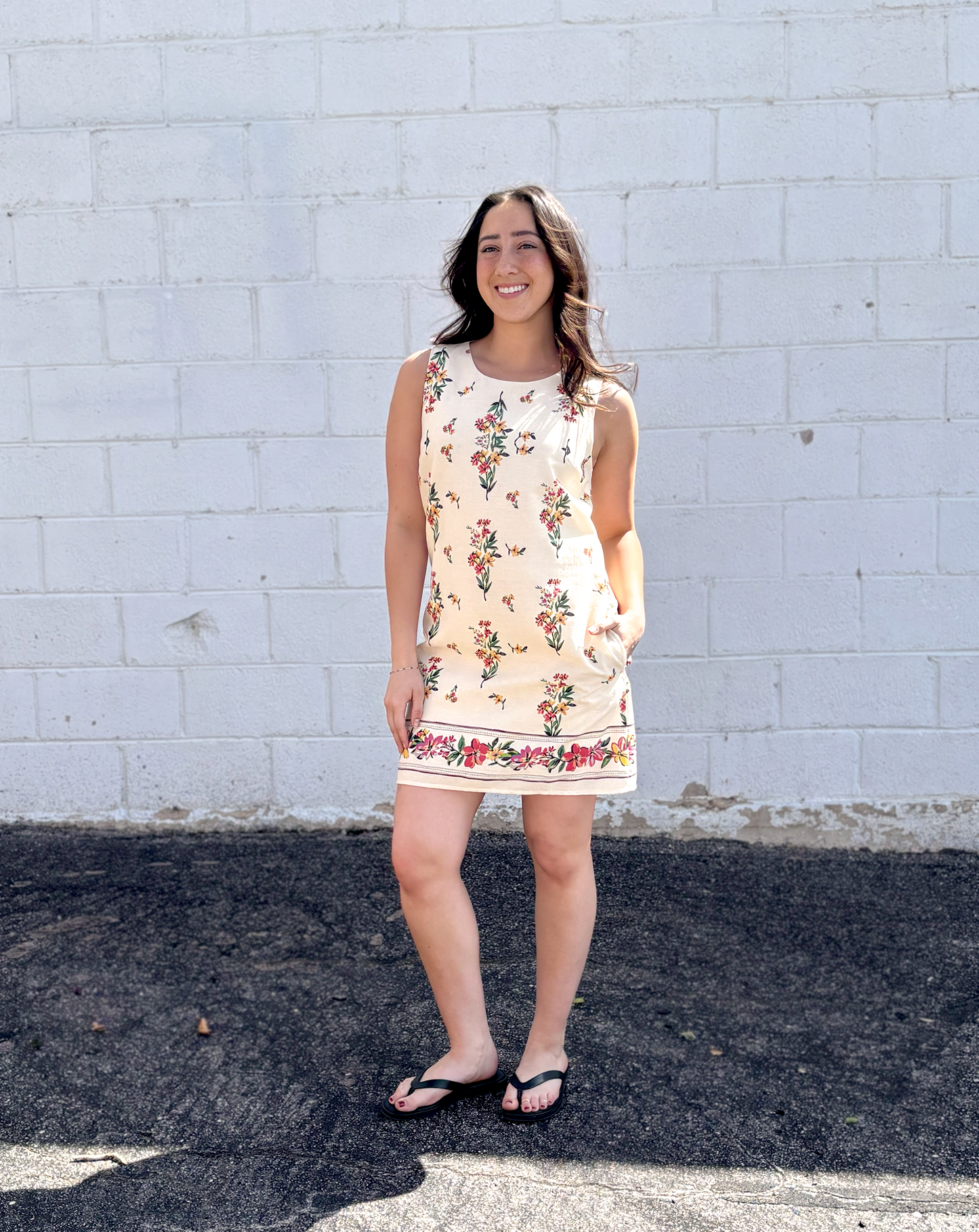 Cute short sleeveless dress with floral pattern