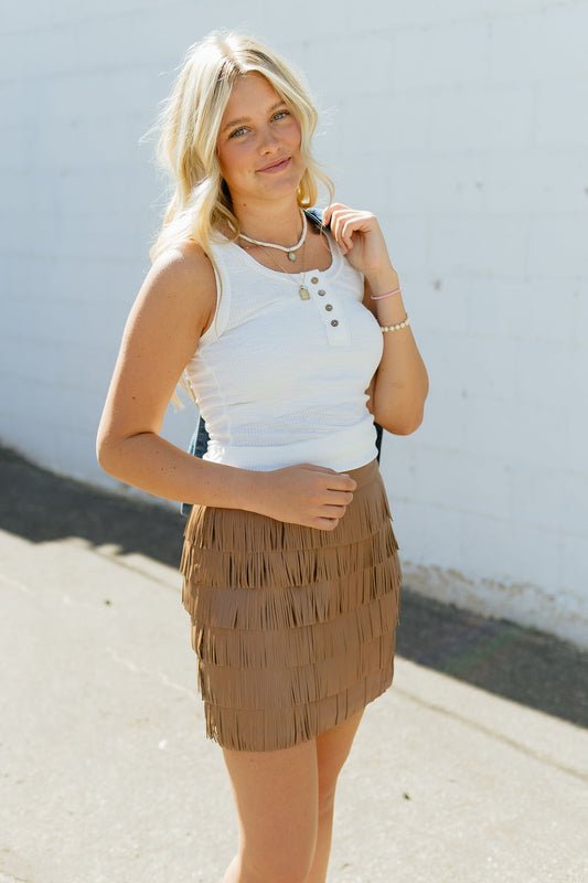 Tan fringe mini skirt