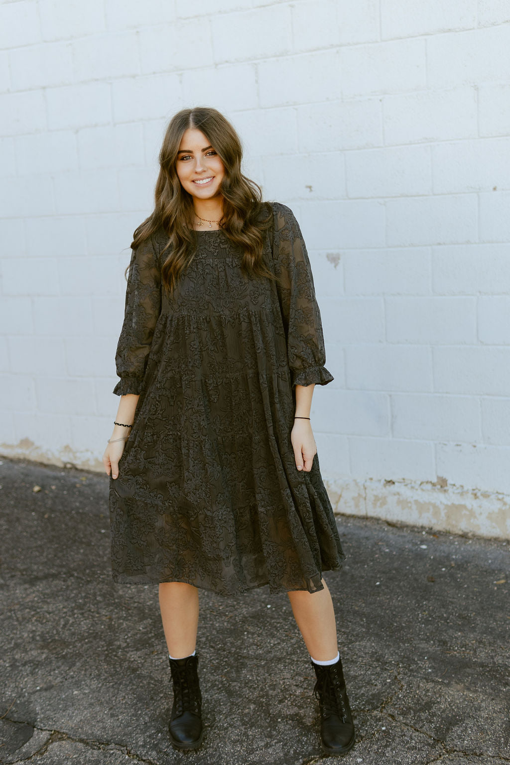 Gray dress with gray embroidered floral pattern all over