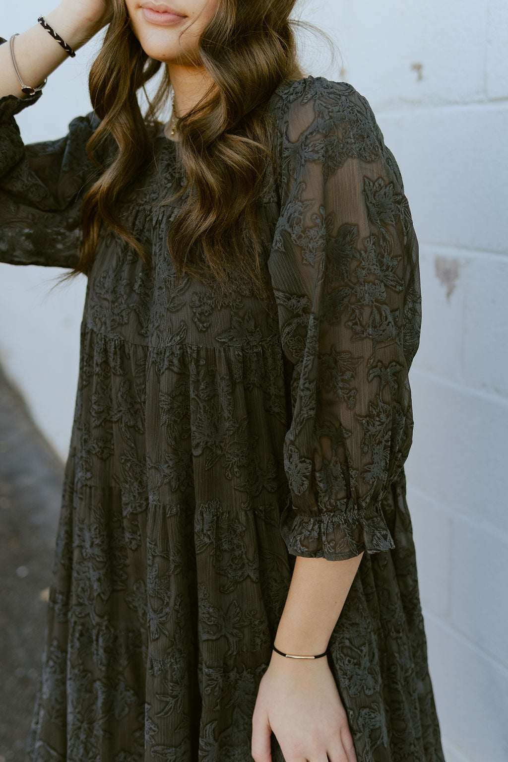 Gray dress with gray embroidered floral pattern all over