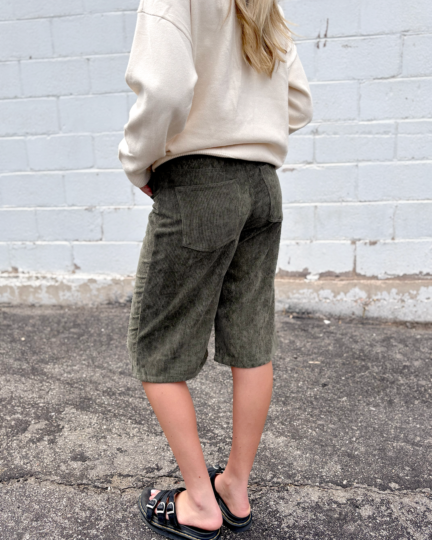 Green corduroy long shorts