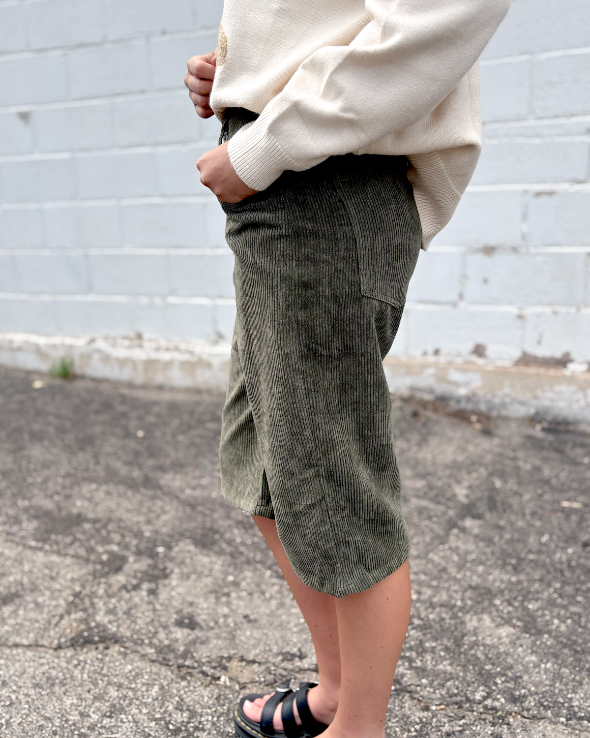 Green corduroy long shorts