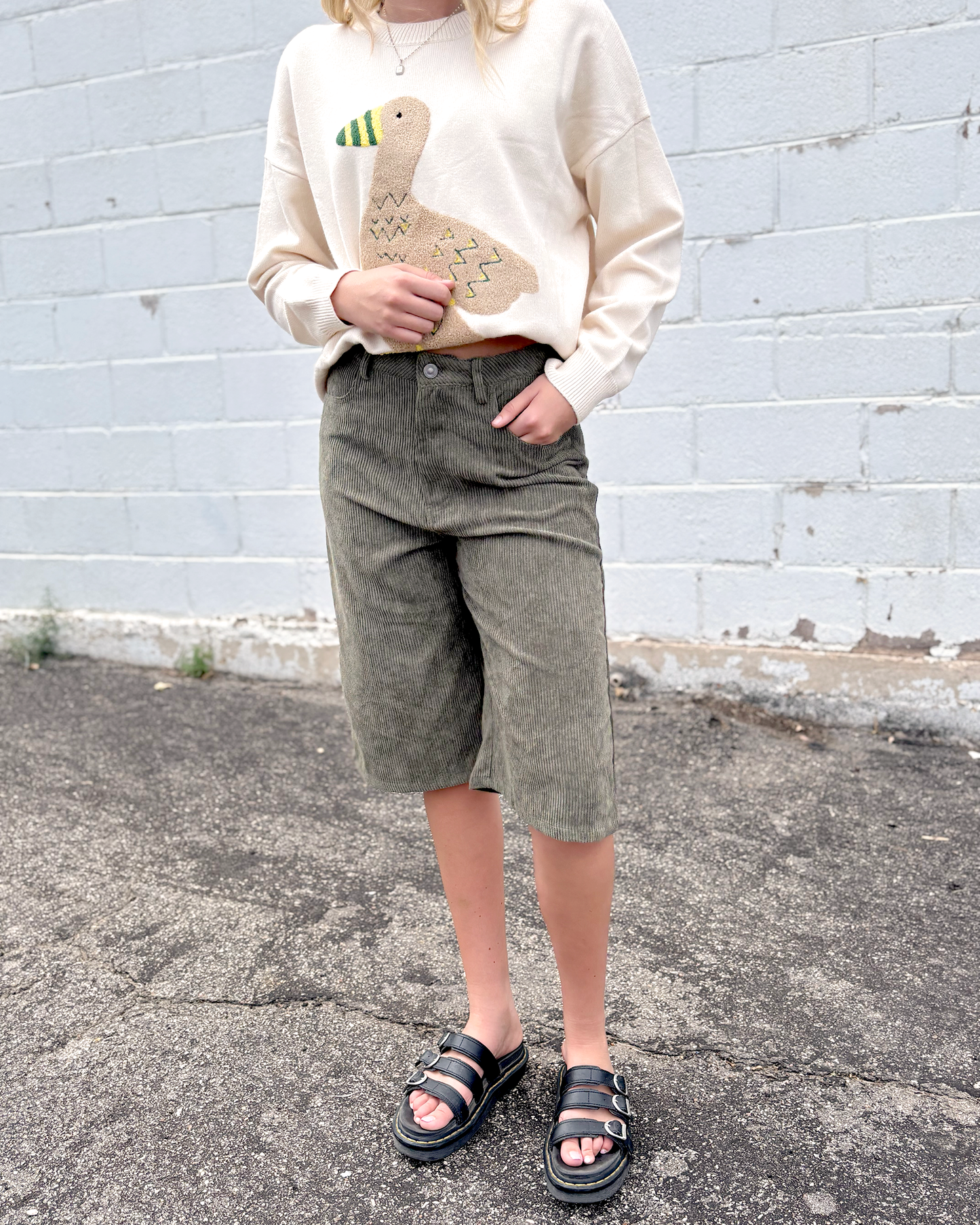 Green corduroy long shorts