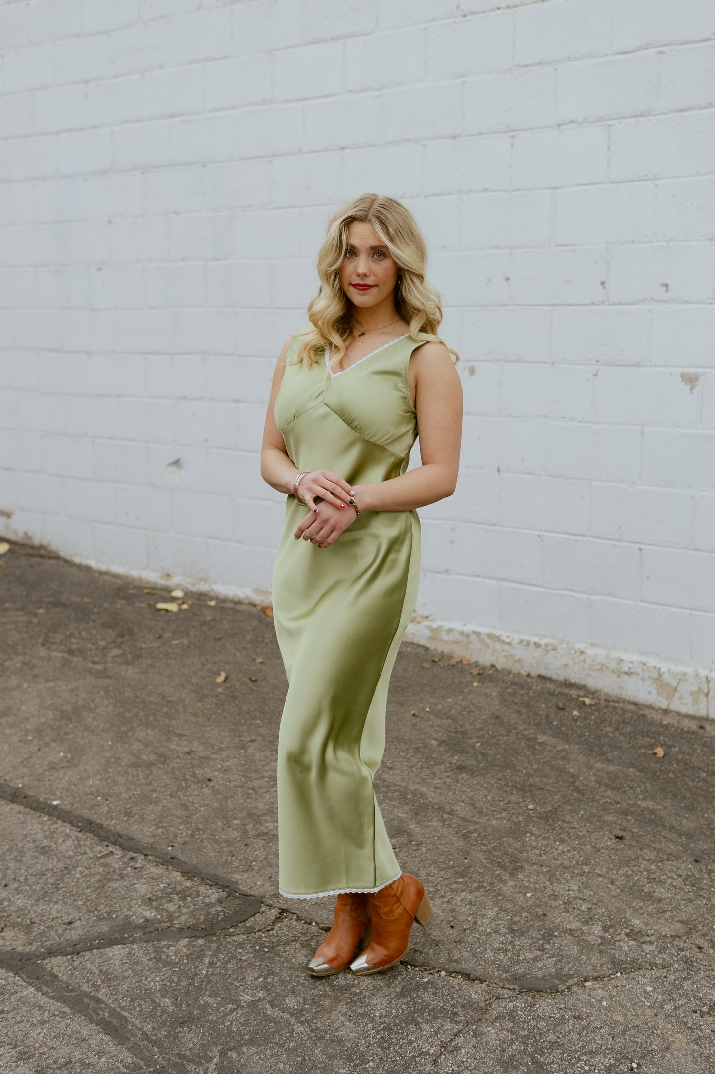 Light green silk dress with v neck and lace trim