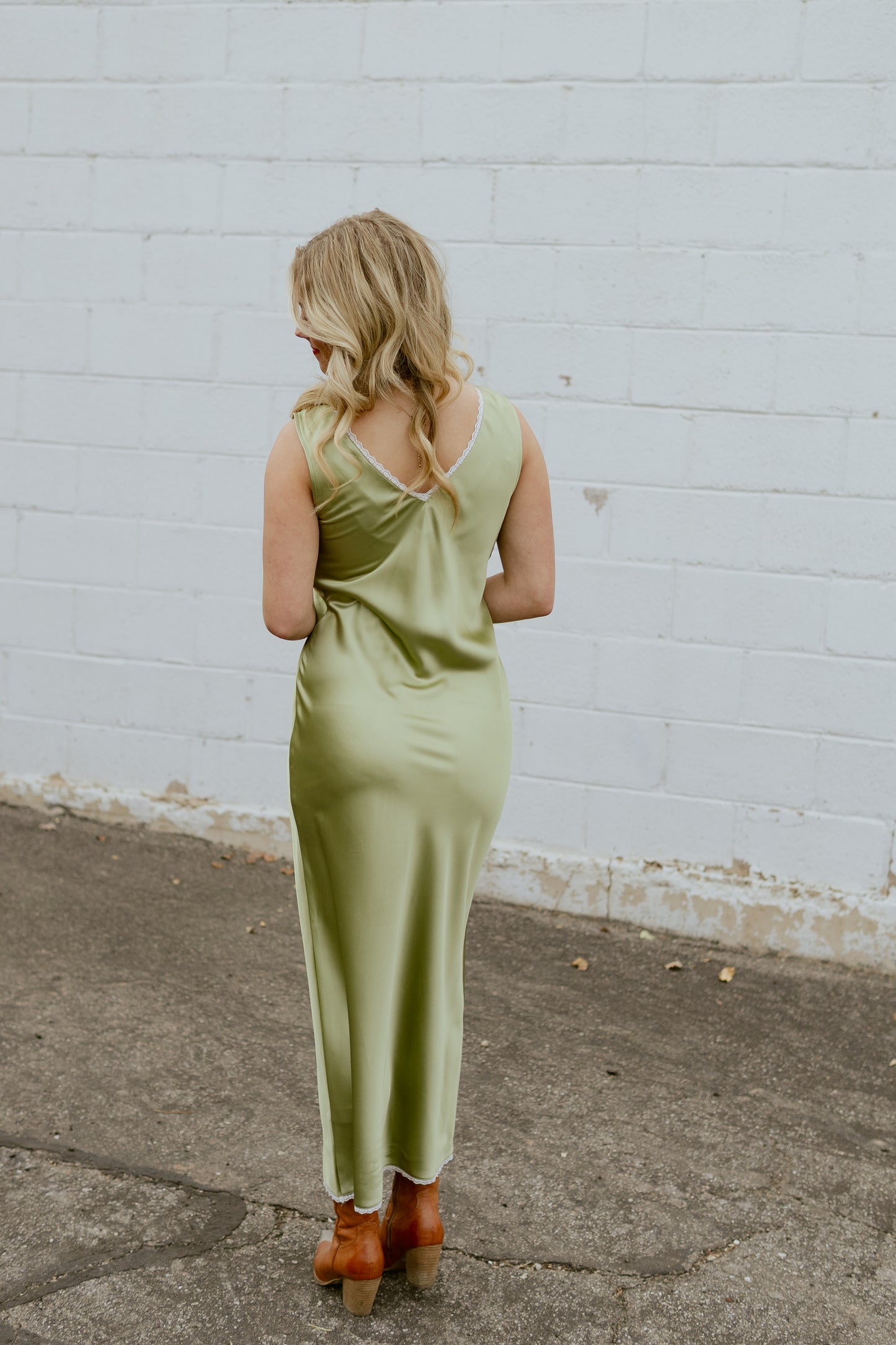 Light green silk dress with v neck and lace trim