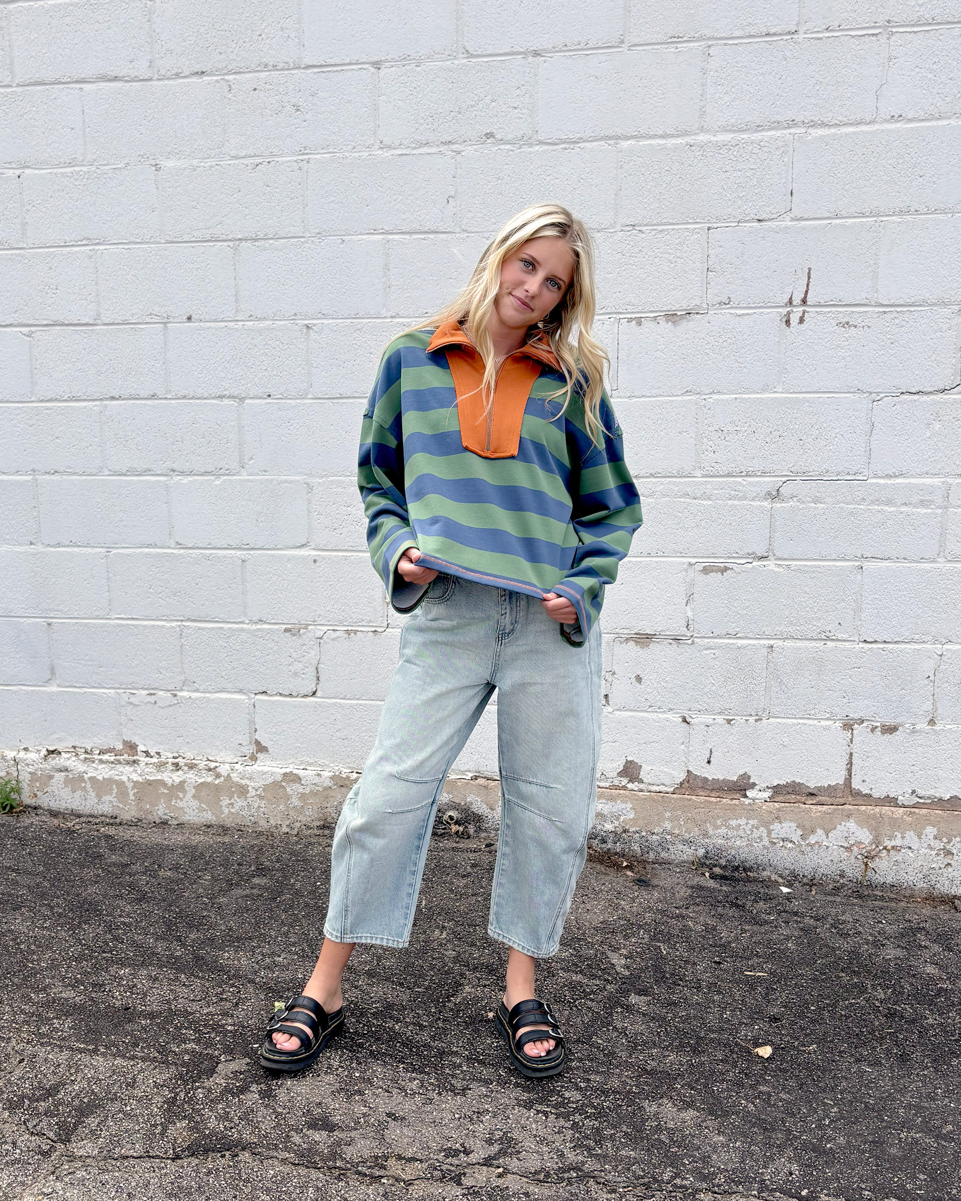 Green and blue striped half zip sweater
