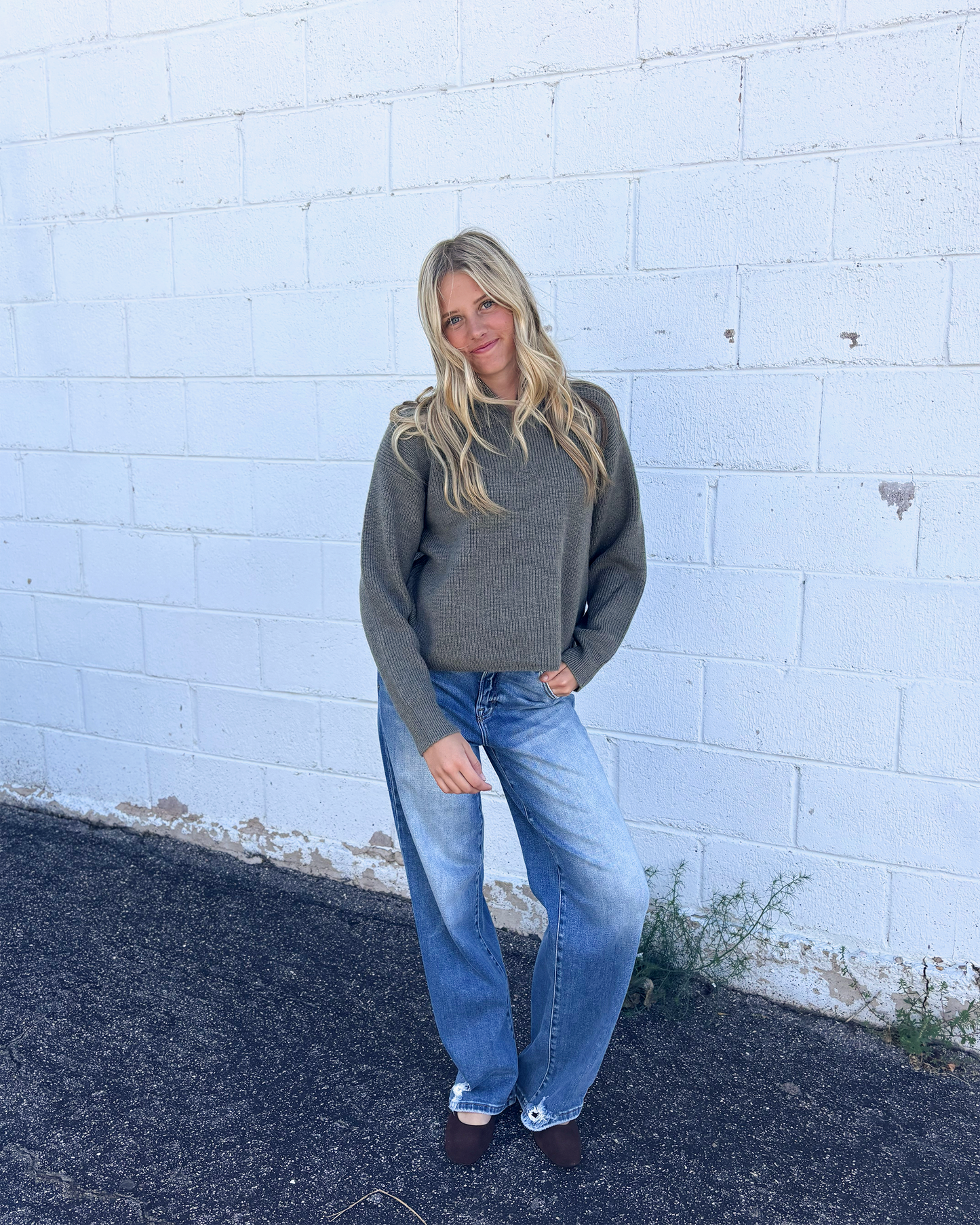 grey green sweater with long sleeves and half zip