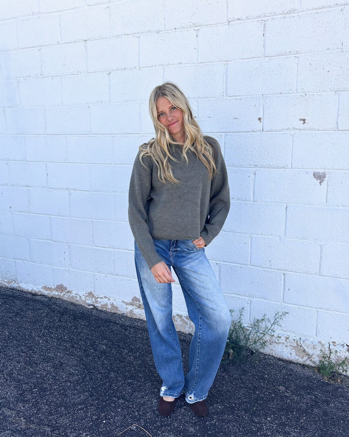 grey green sweater with long sleeves and half zip