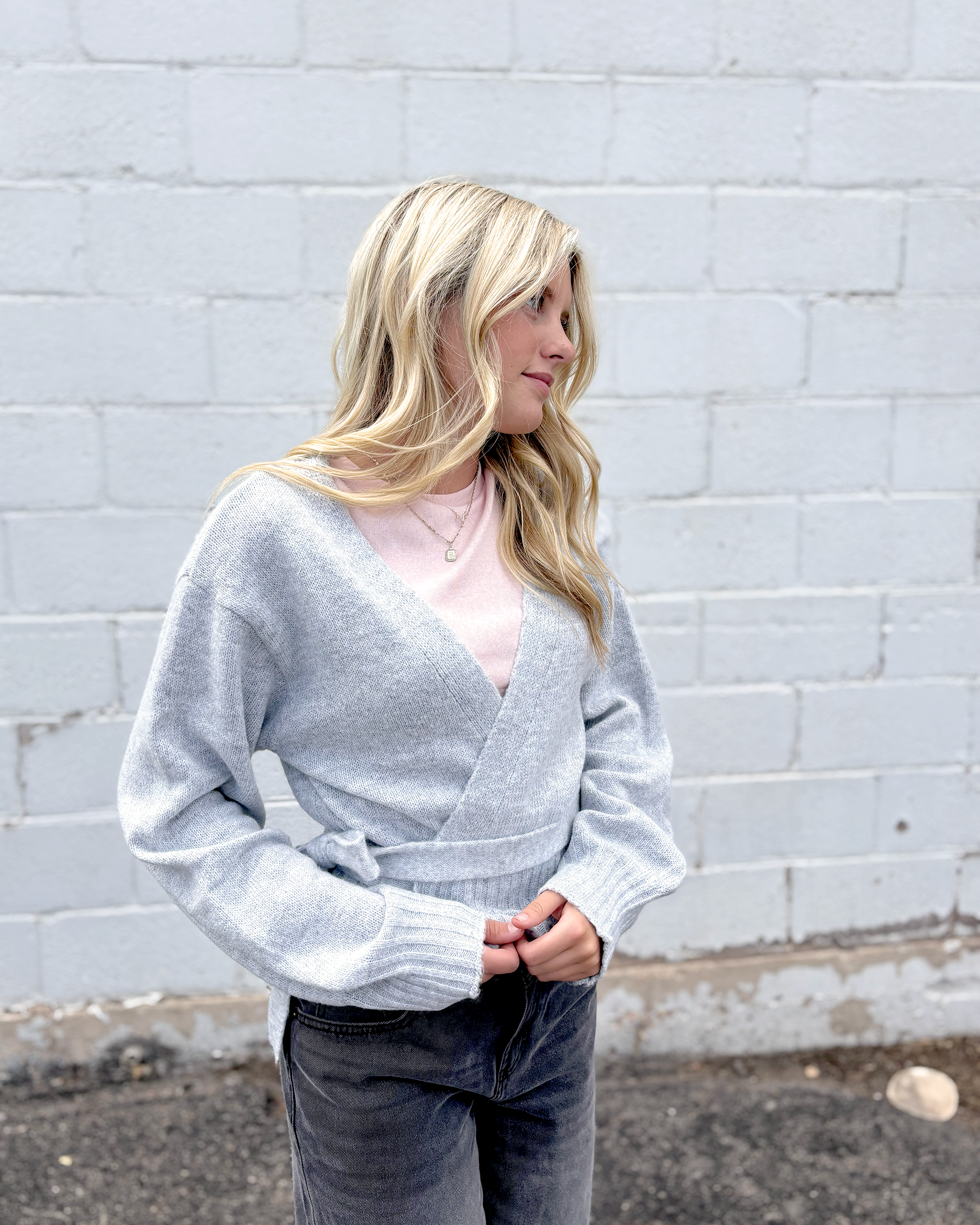 Grey wrap sweater with long sleeves