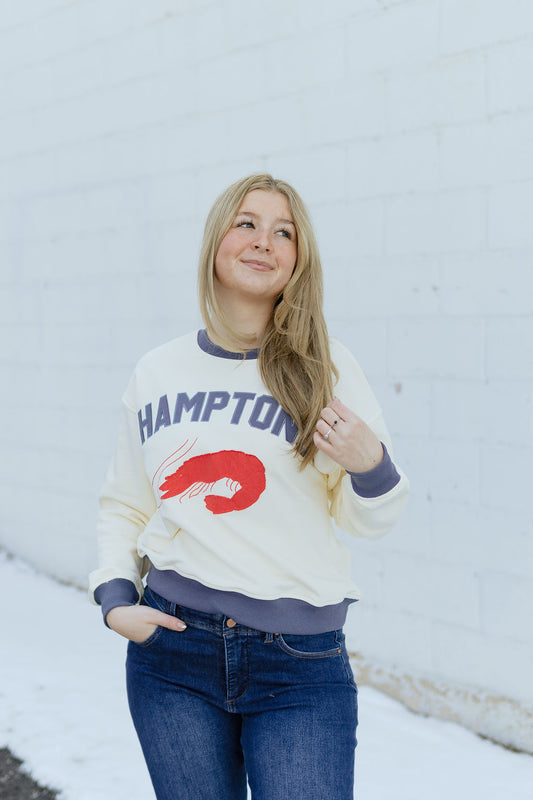 sweatshirt with HAMPTONS and a lobster appliquéd on the front