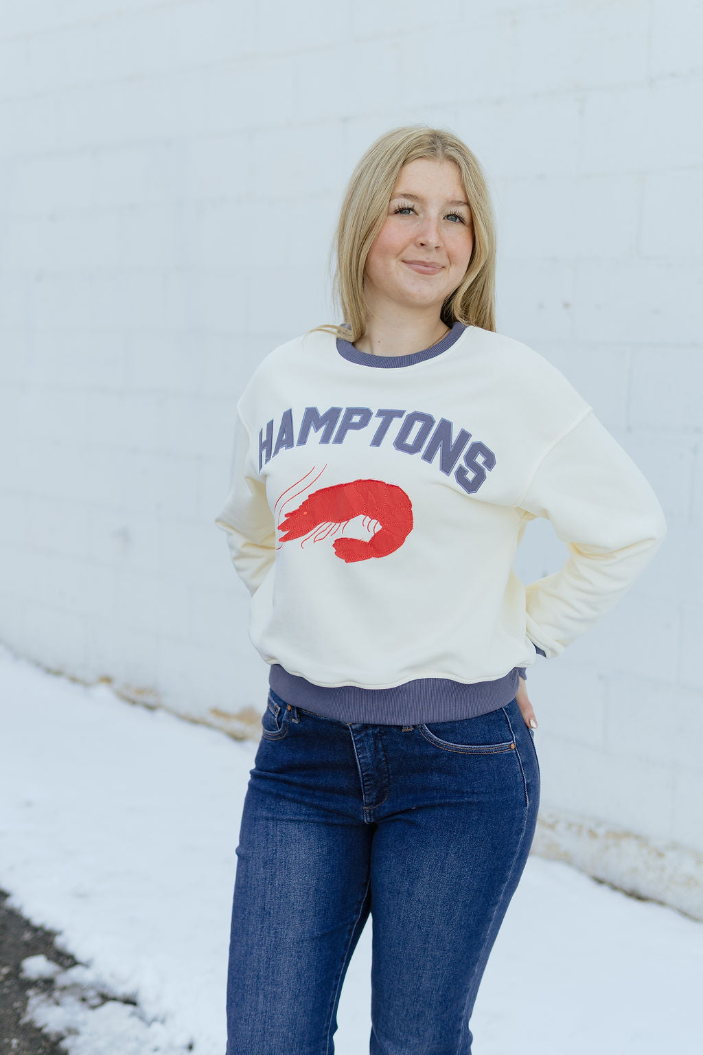 sweatshirt with HAMPTONS and a lobster appliquéd on the front