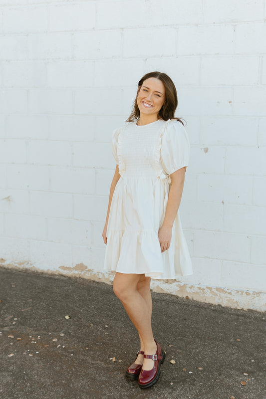 Ivory scoop neck dress with tie details