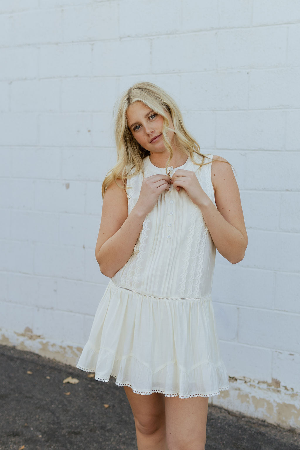 Ivory dress with pin tucks and pleats