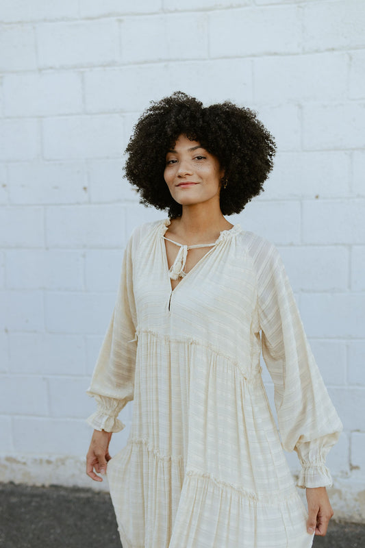 Ivory woven dress with A-line cut and puff long sleeves