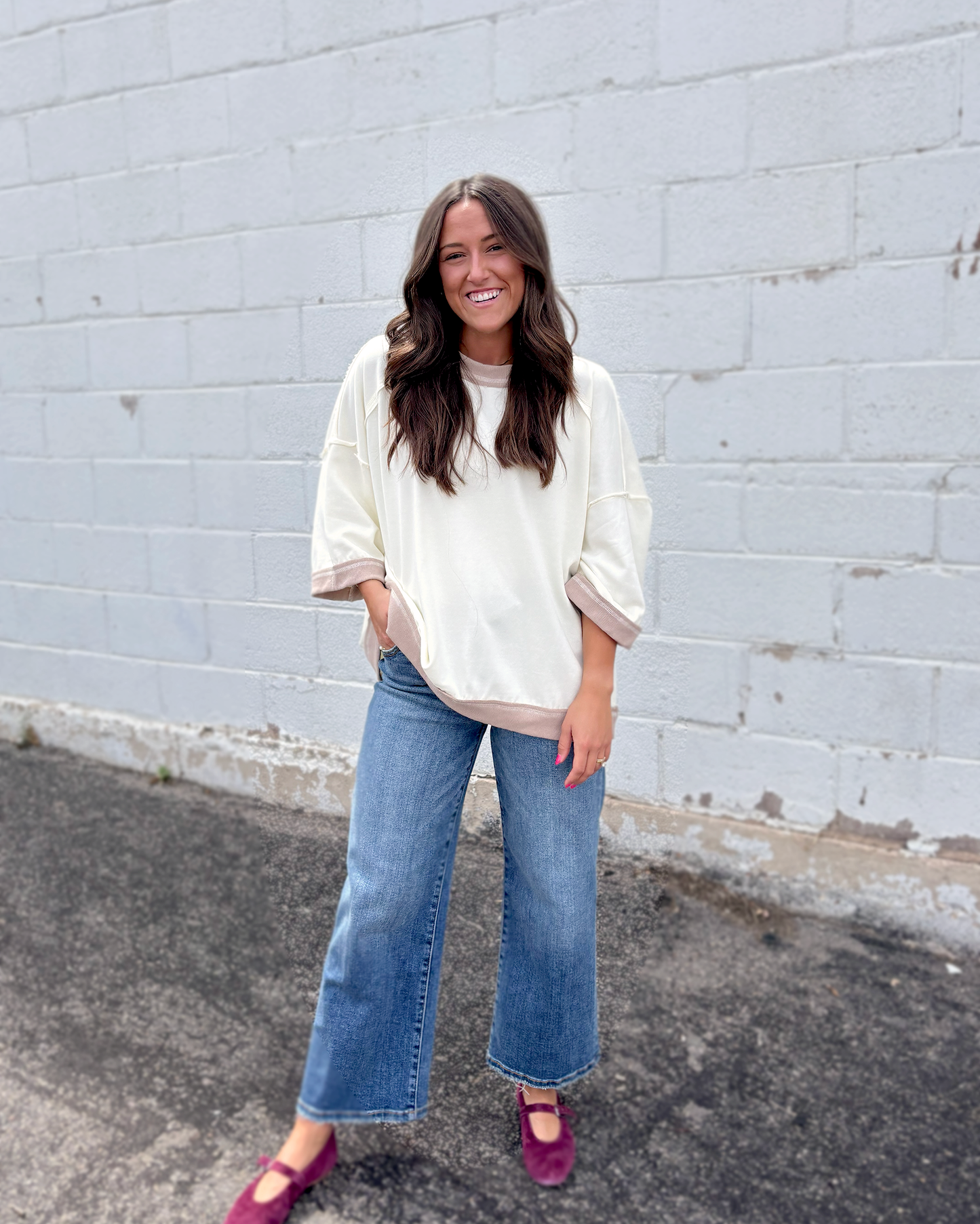 Ivory oversized sweater with beige trim