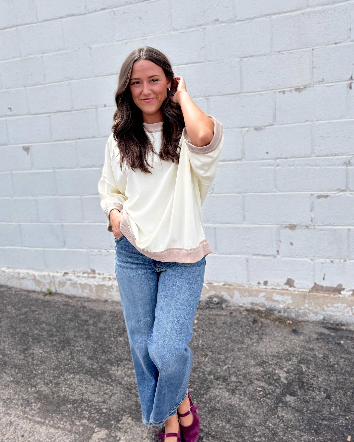 Ivory oversized sweater with beige trim