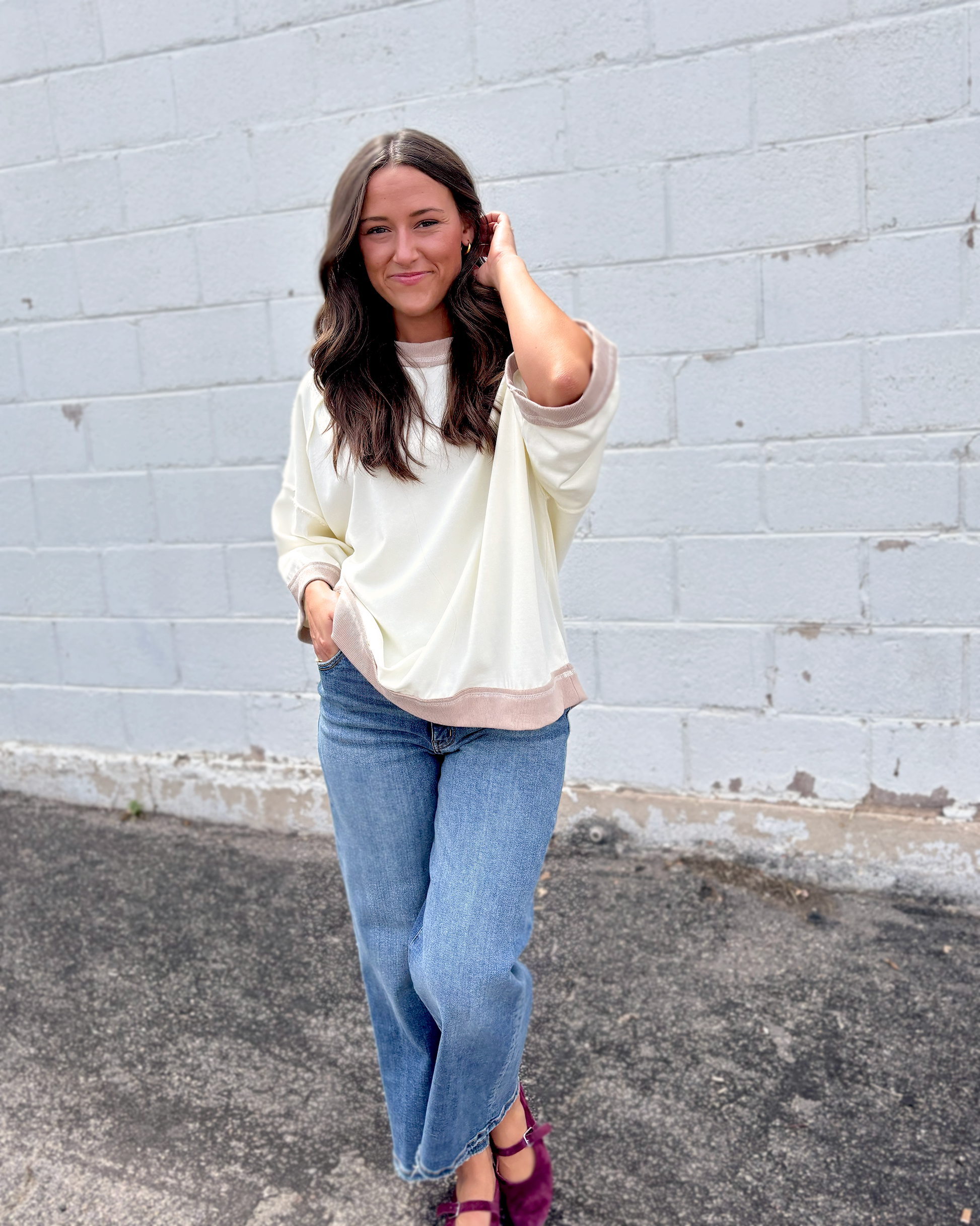 Ivory oversized sweater with beige trim