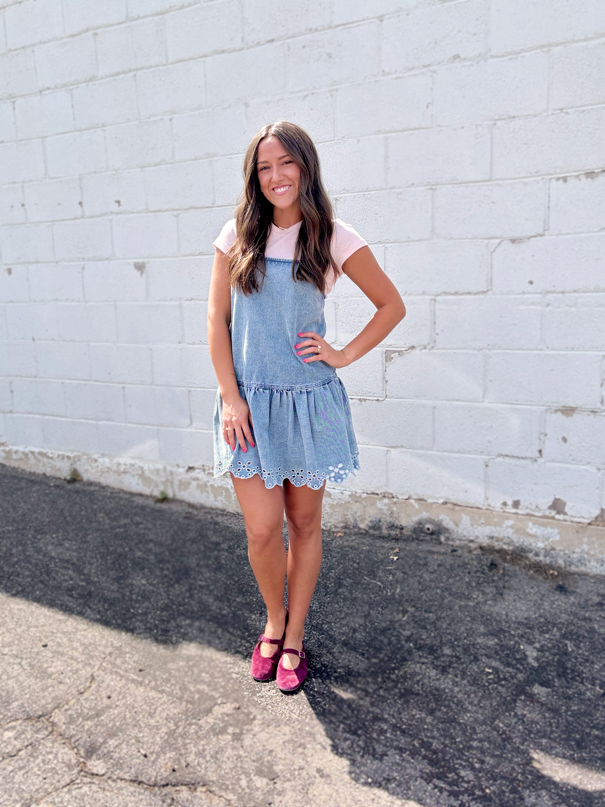 light blue denim pinafore-style mini dress