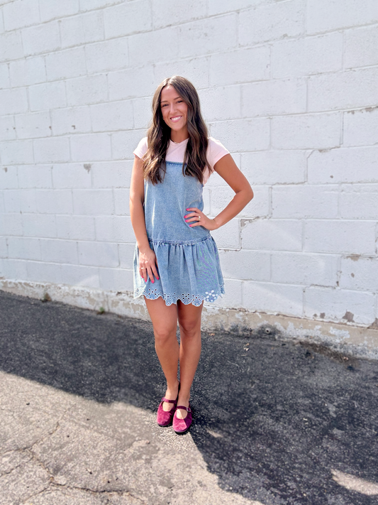 light blue denim pinafore-style mini dress