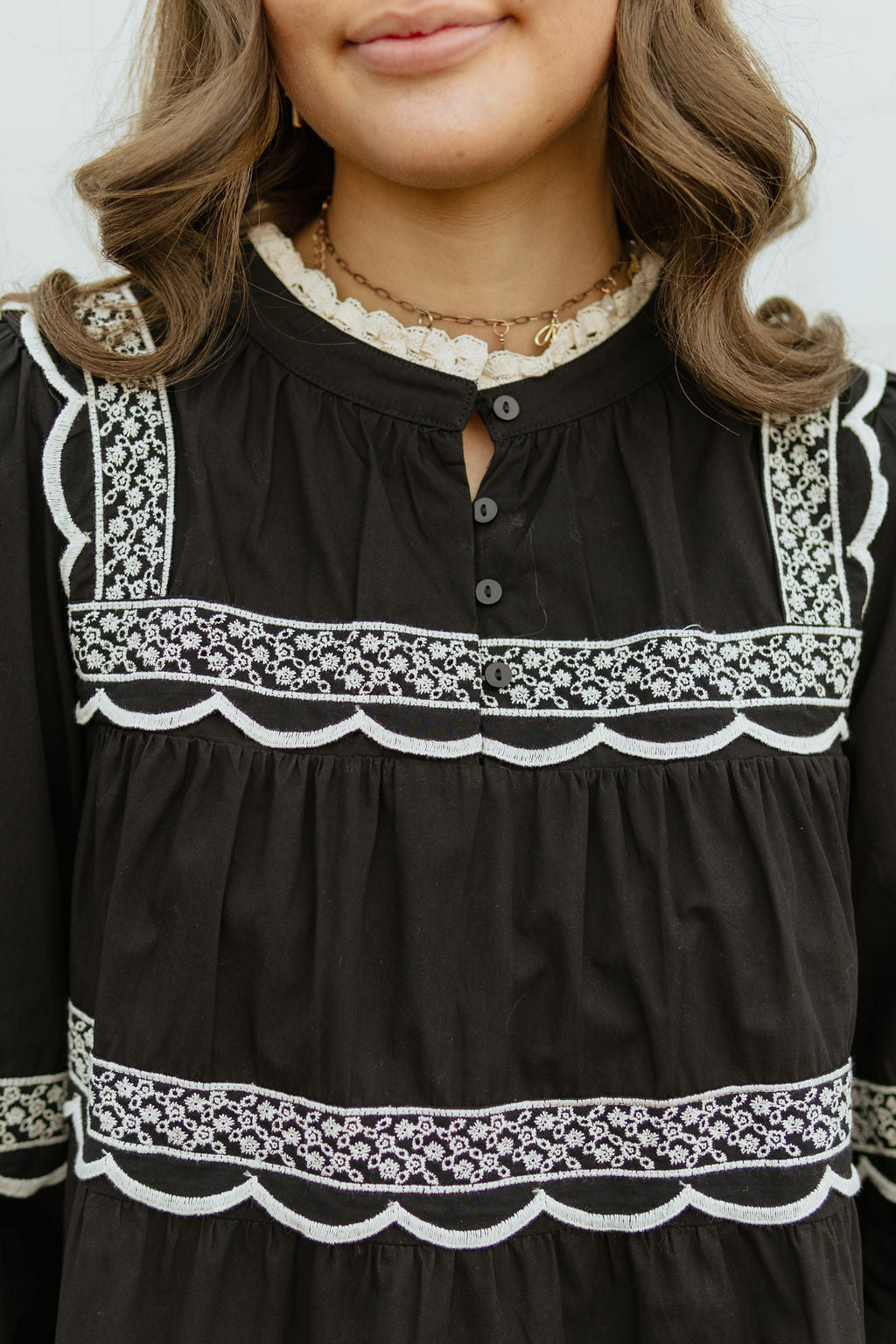 Black dress with ivory lace trim