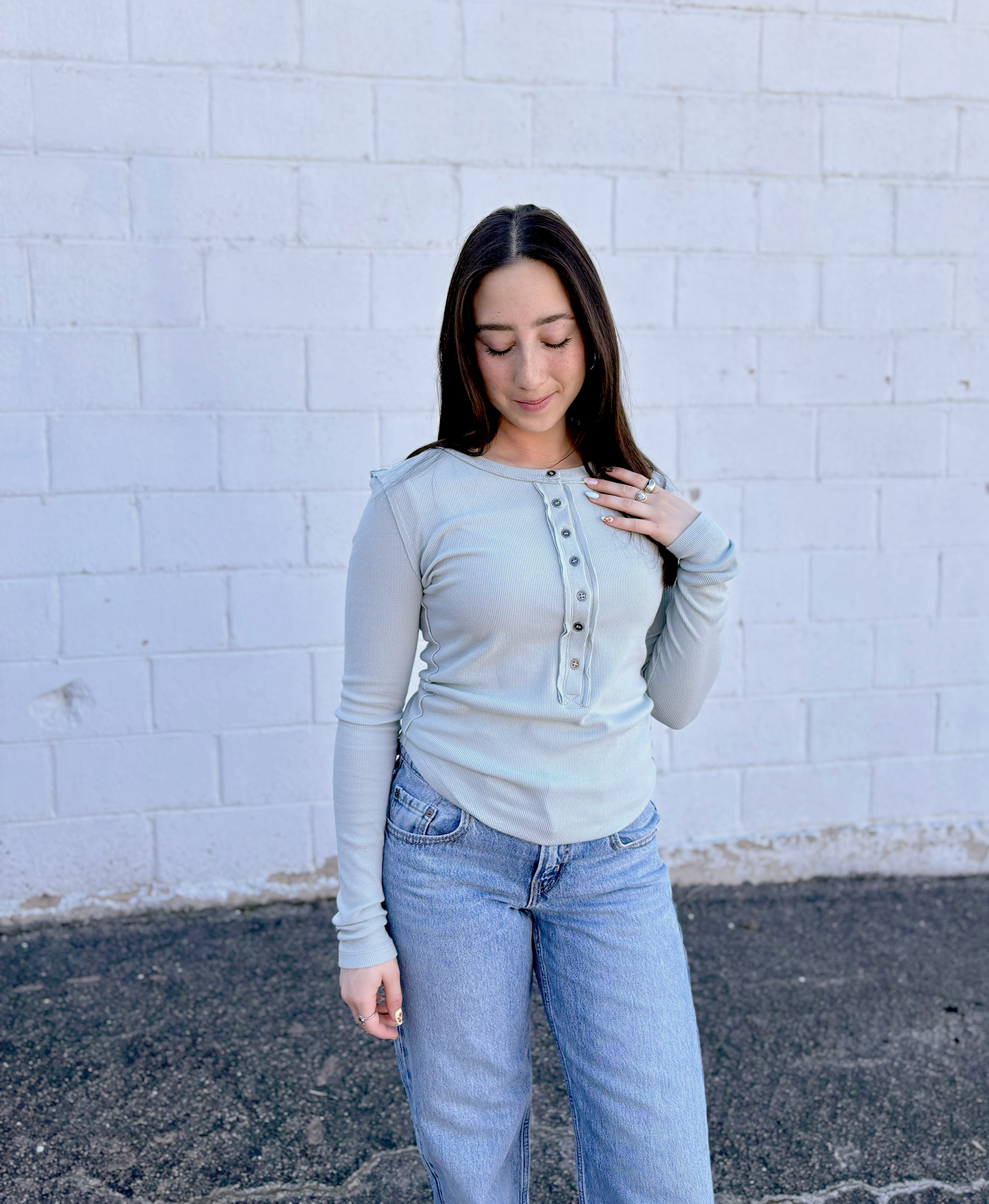 Sage colored long sleeved ribbed tee with buttons up the front