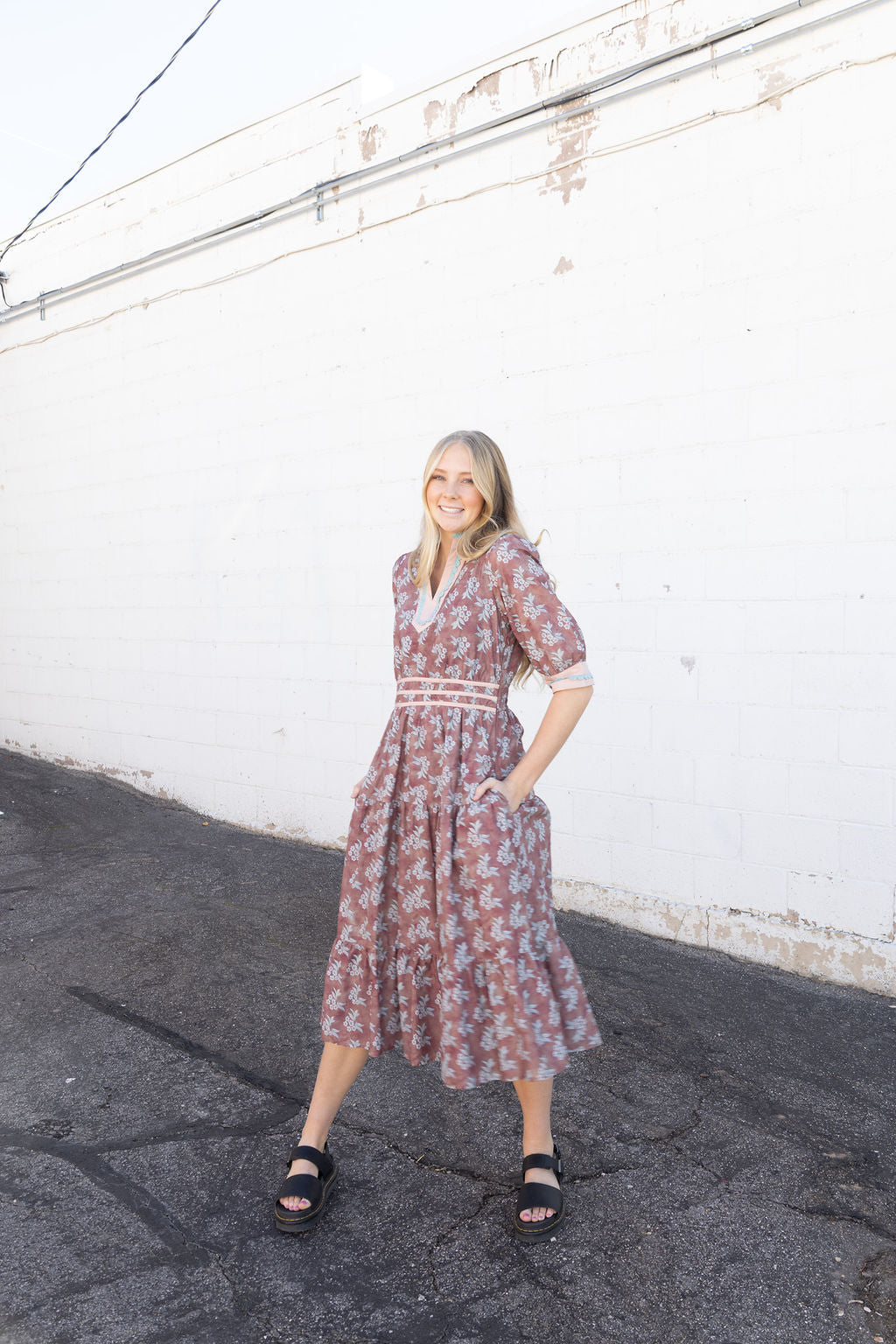 Mauve dress with white and teal floral details