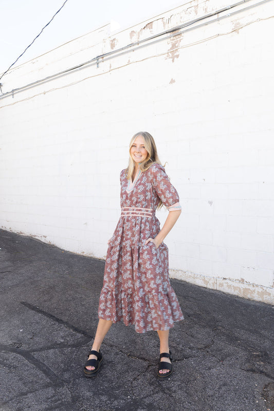Mauve dress with white and teal floral details