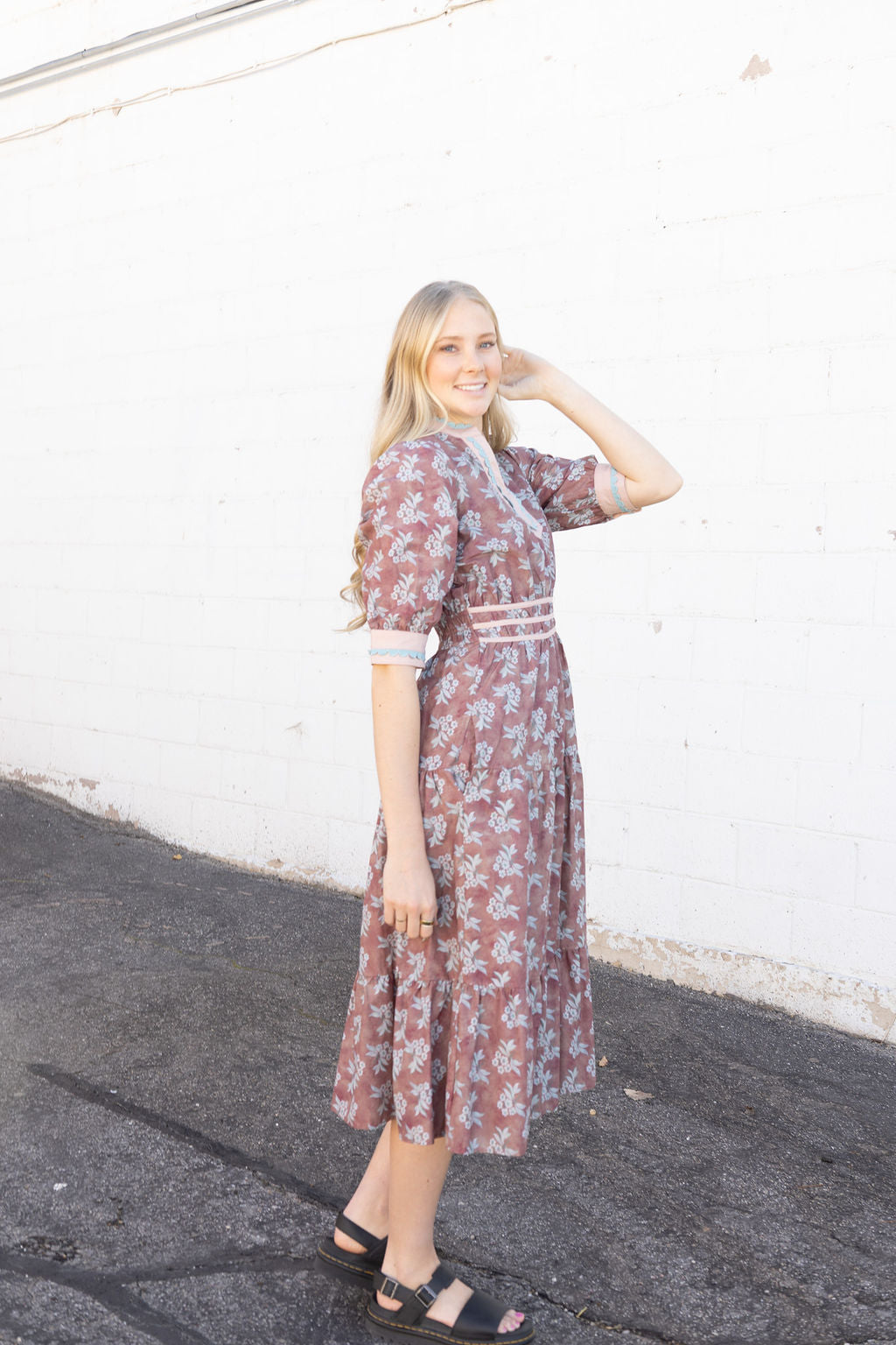 Mauve dress with white and teal floral details