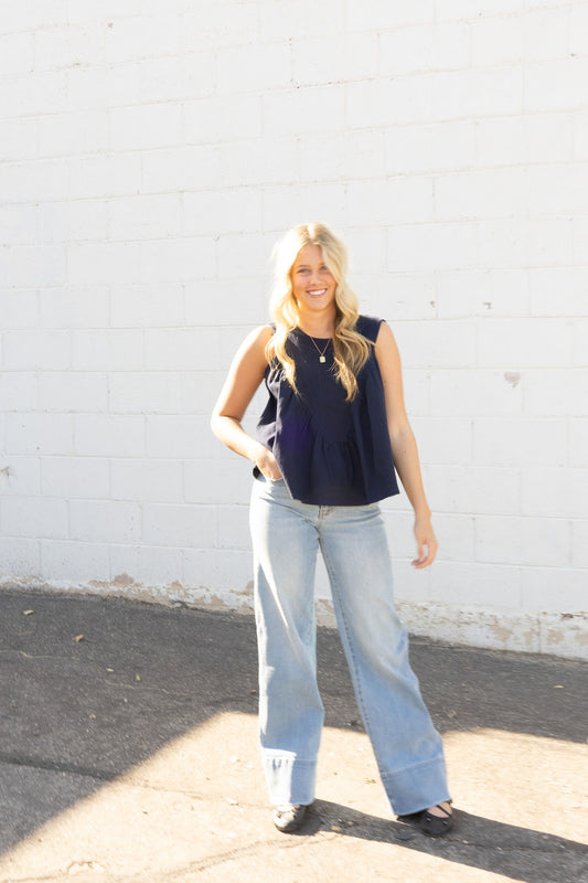 Navy sleeveless top with rusched V