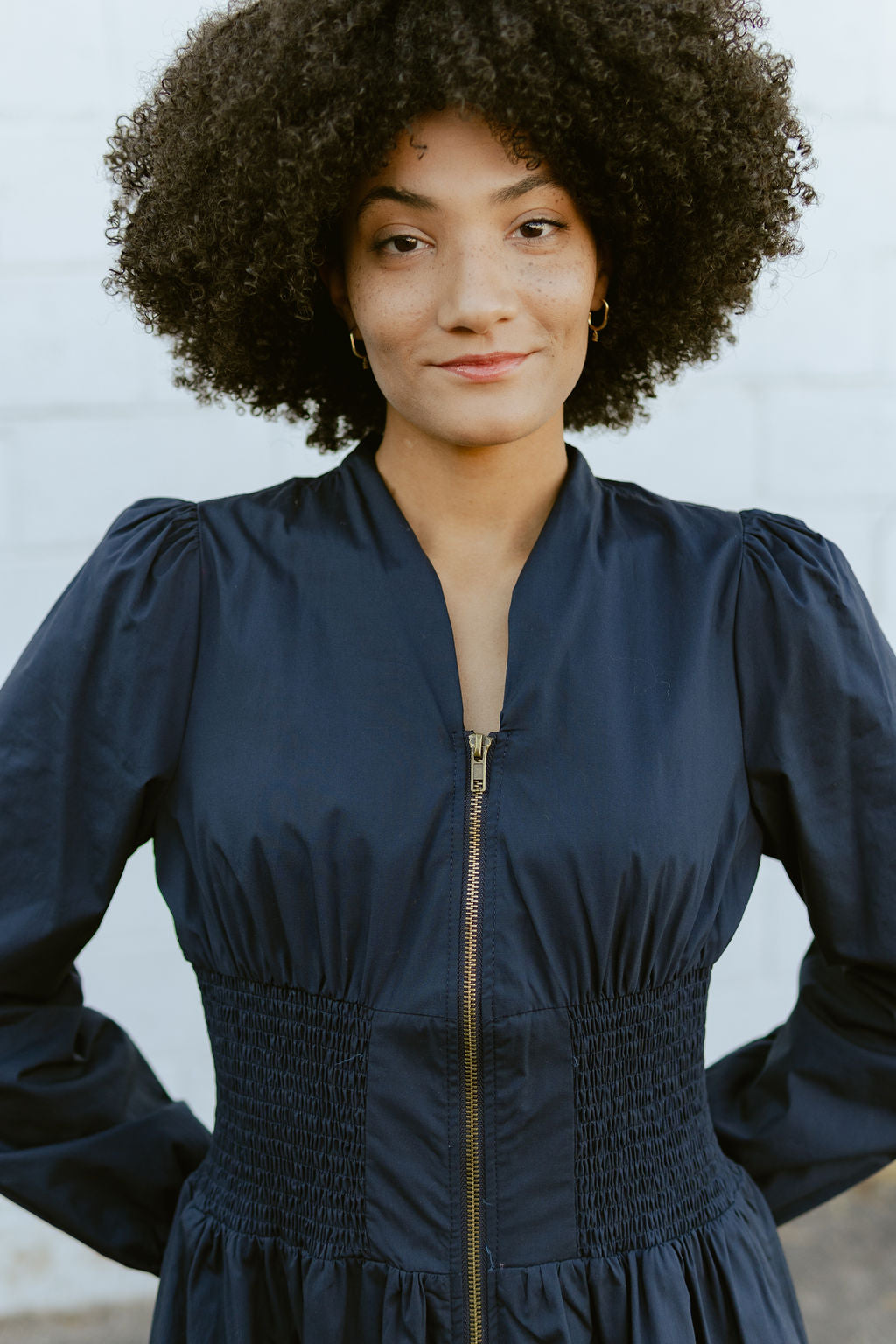 Navy dress with long sleeves and full front zipper