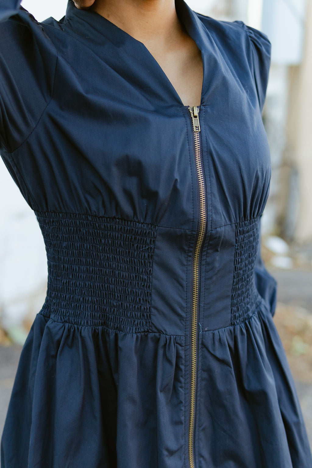 Navy dress with long sleeves and full front zipper