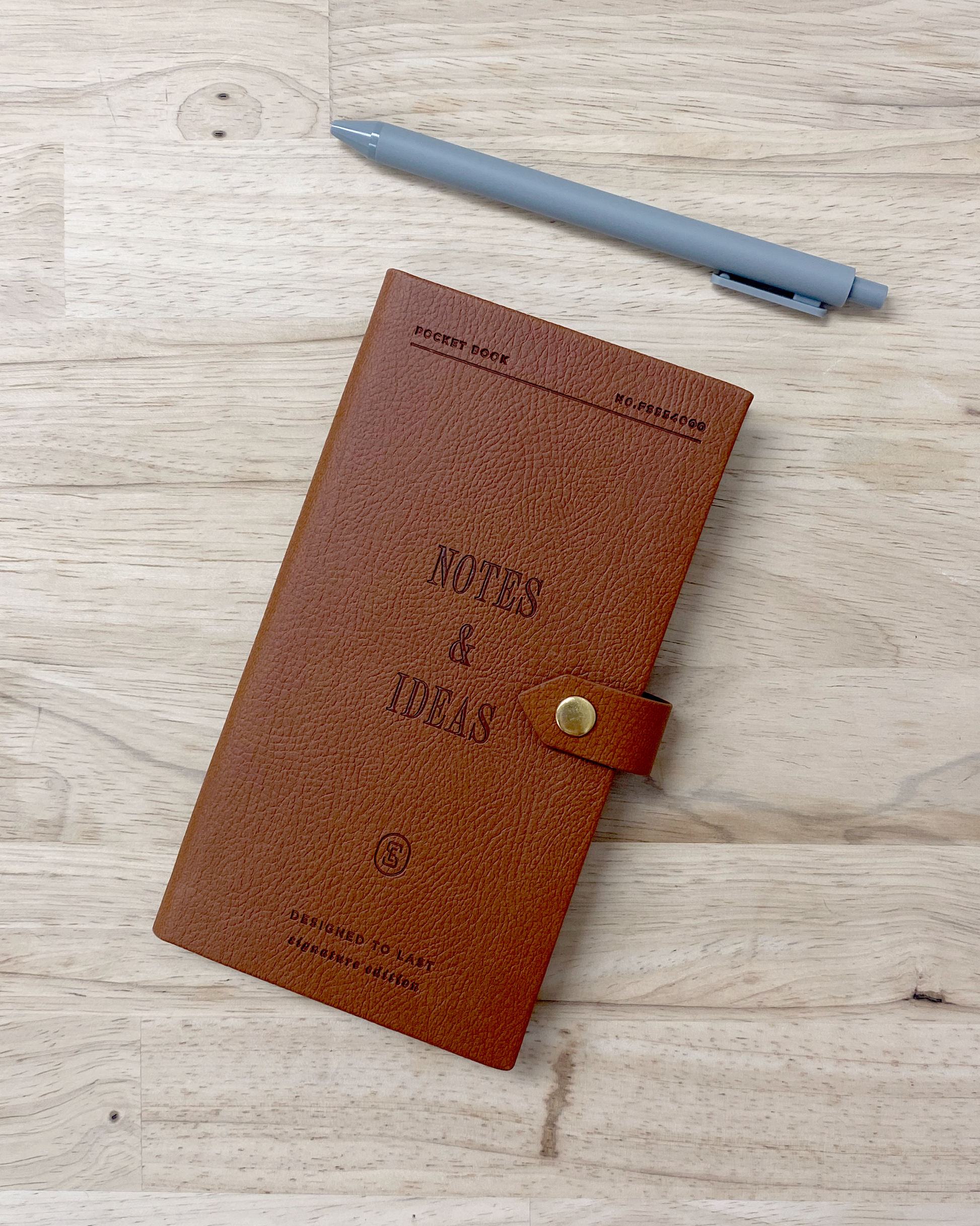 Leather bound notebook with grid paper