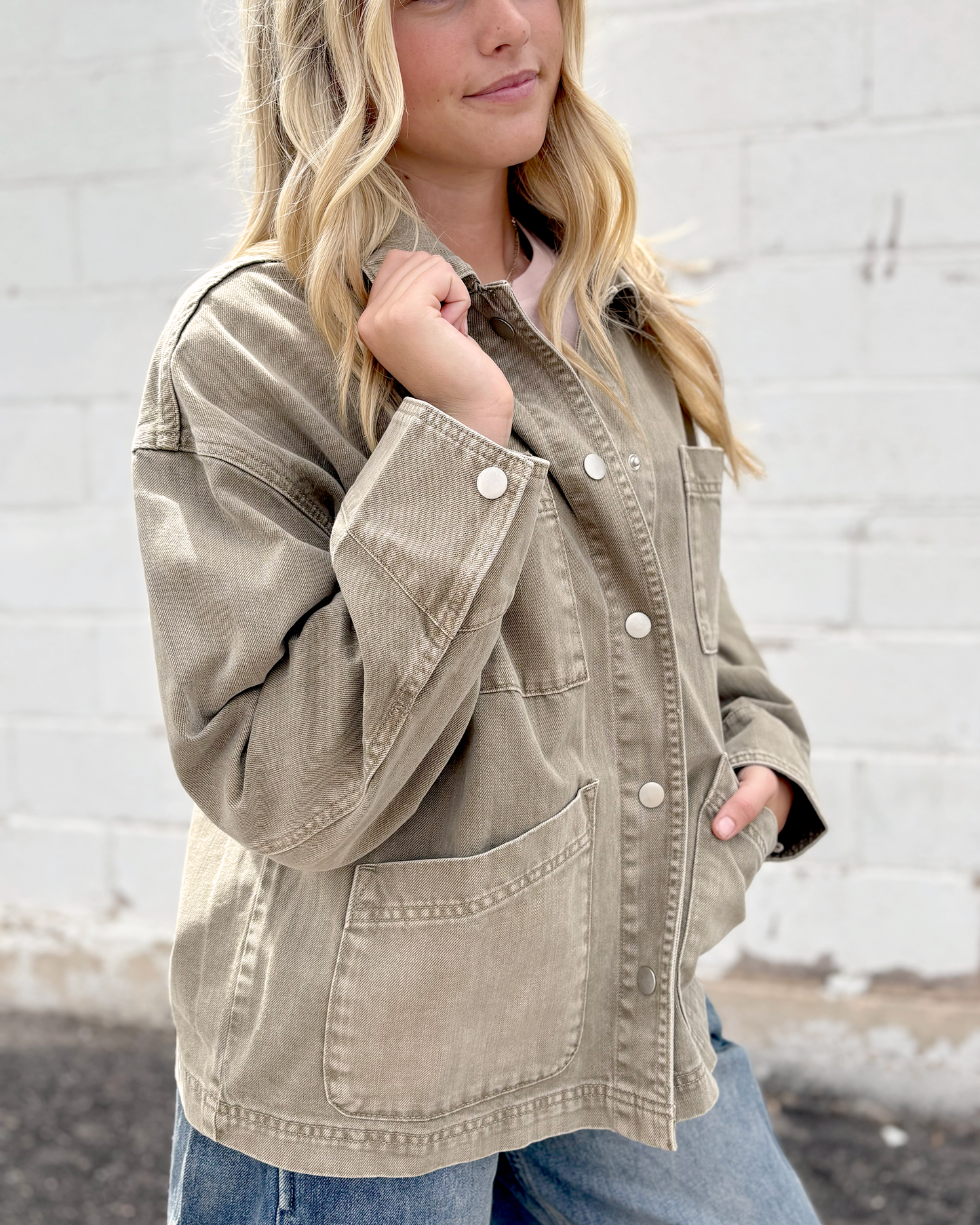 light olive barn jacket with snaps up the front