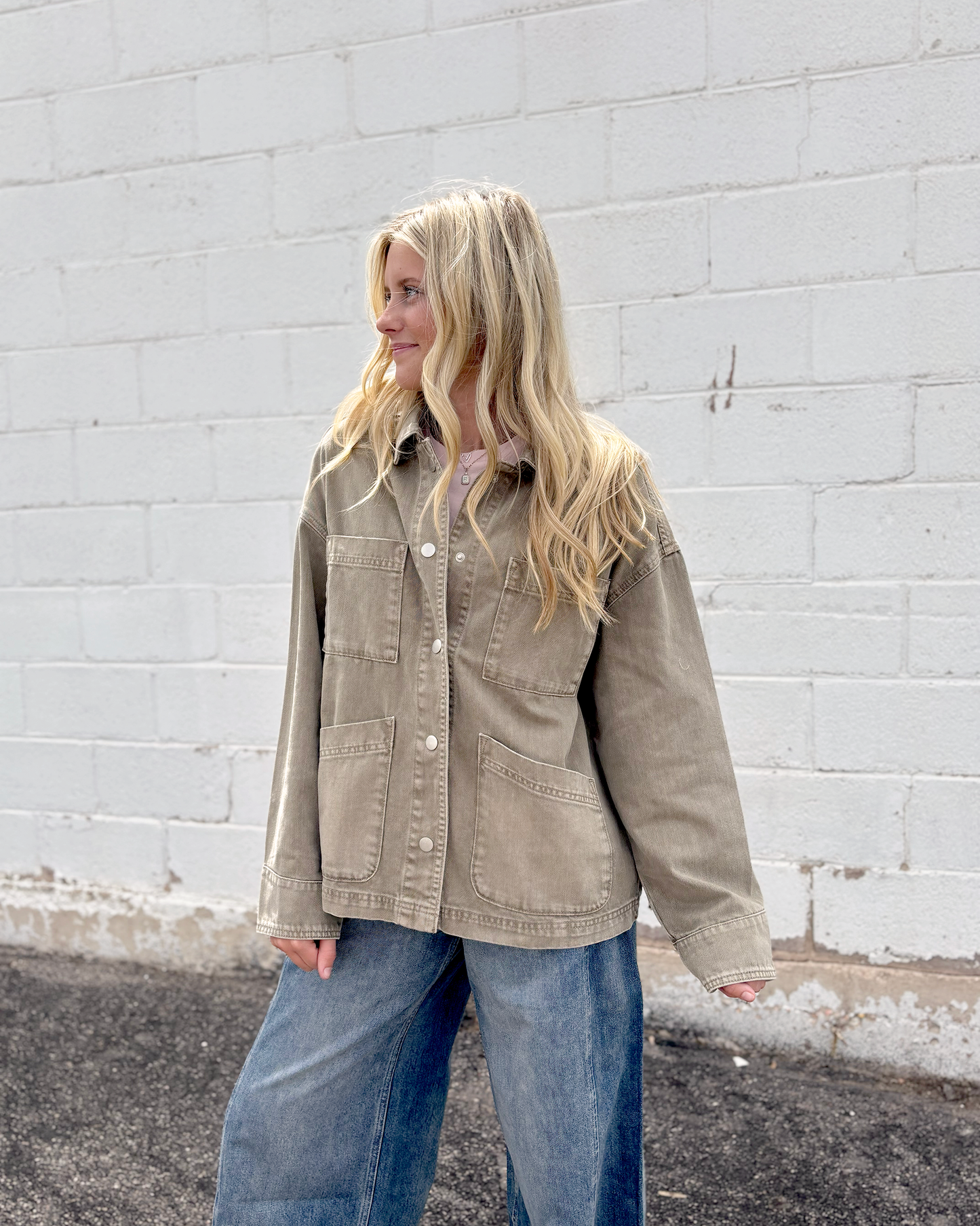 light olive barn jacket with snaps up the front