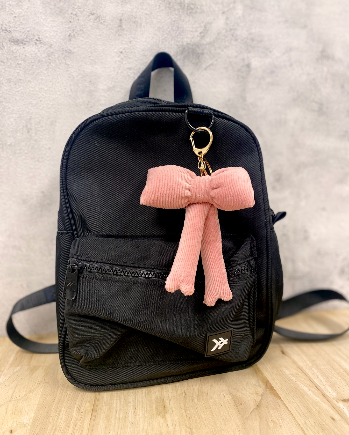 Pink bow bag charm