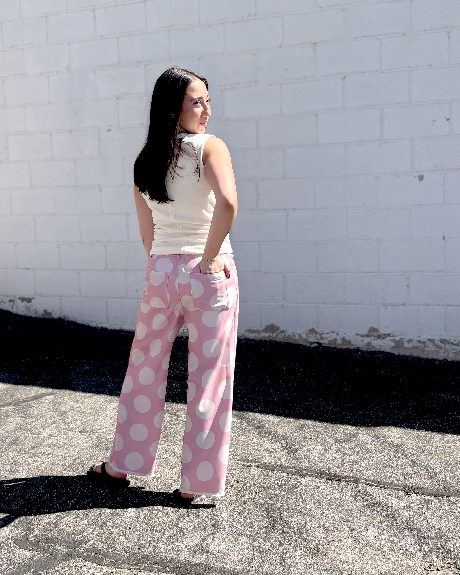 Pink wide leg pats with a big white polka dot print