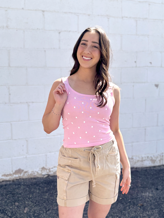 pink tank top with small white polka dots