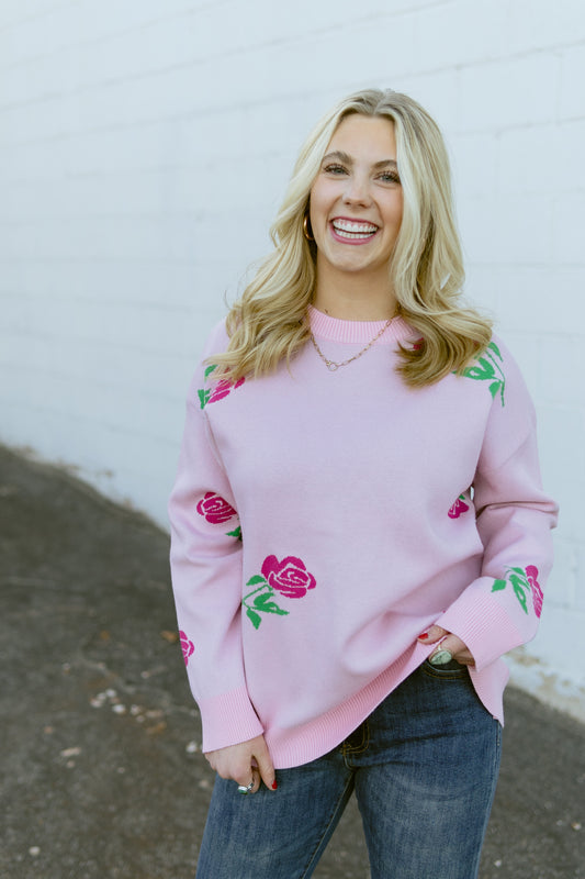 Pink crew neck sweater with hot pink roses