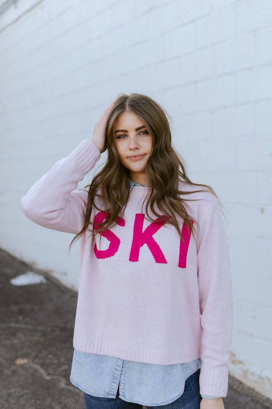 Pink sweater with SKI on the front