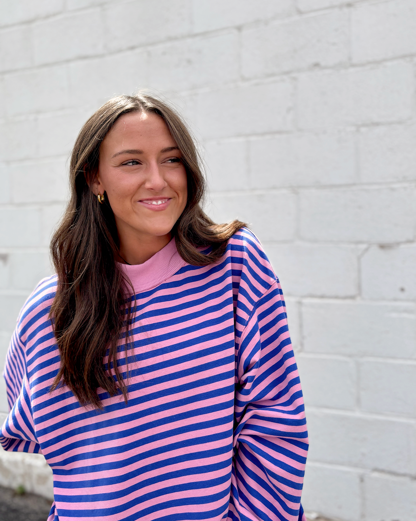 pink and blue striped oversized pullover sweater