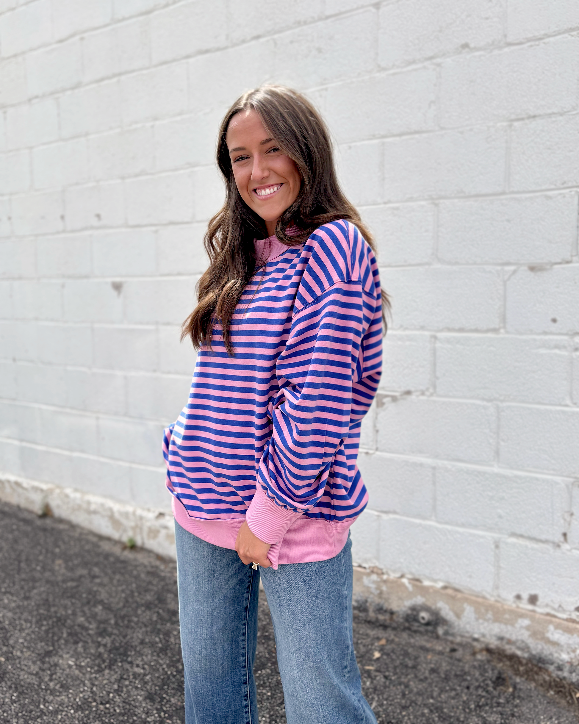 pink and blue striped oversized pullover sweater