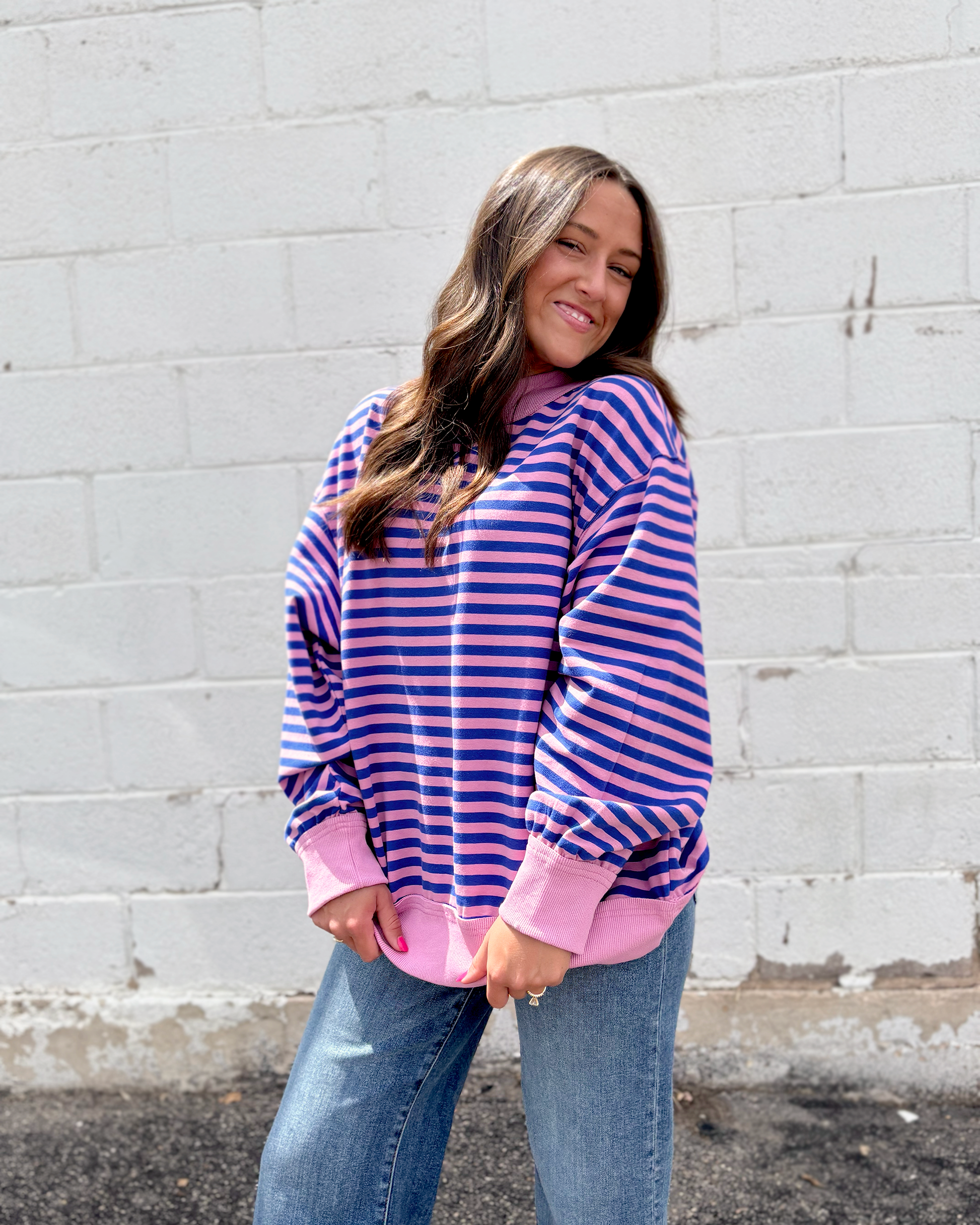 pink and blue striped oversized pullover sweater