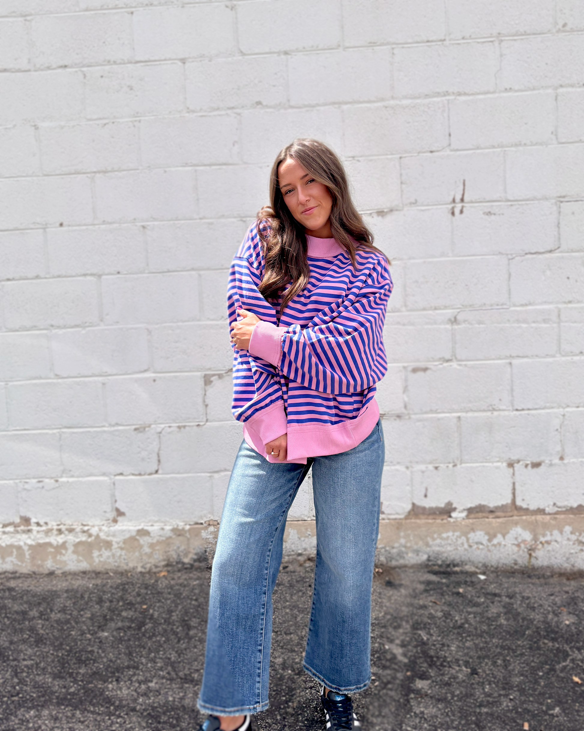 pink and blue striped oversized pullover sweater