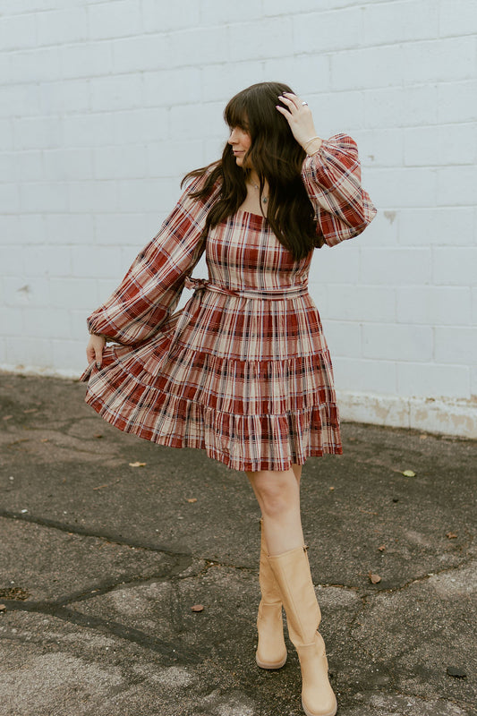 cute short plaid dress with puff sleeves and a belt at the waist