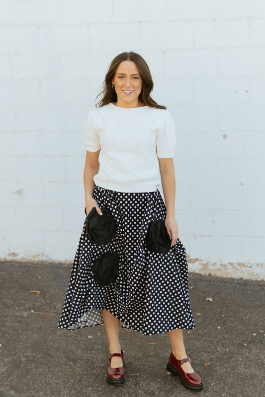 Polka dot skirt with black aplique flowers