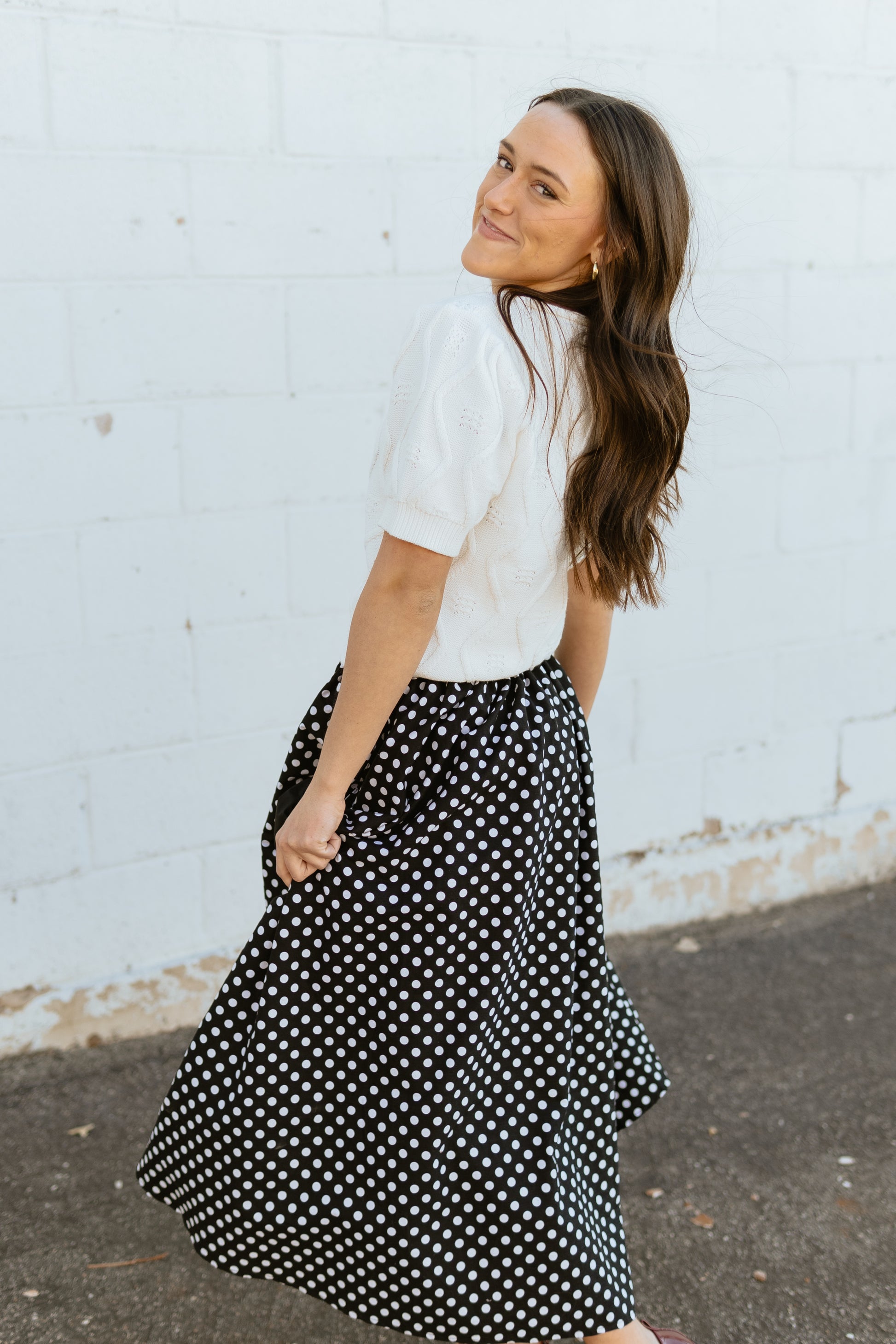 Polka dot skirt with black aplique flowers