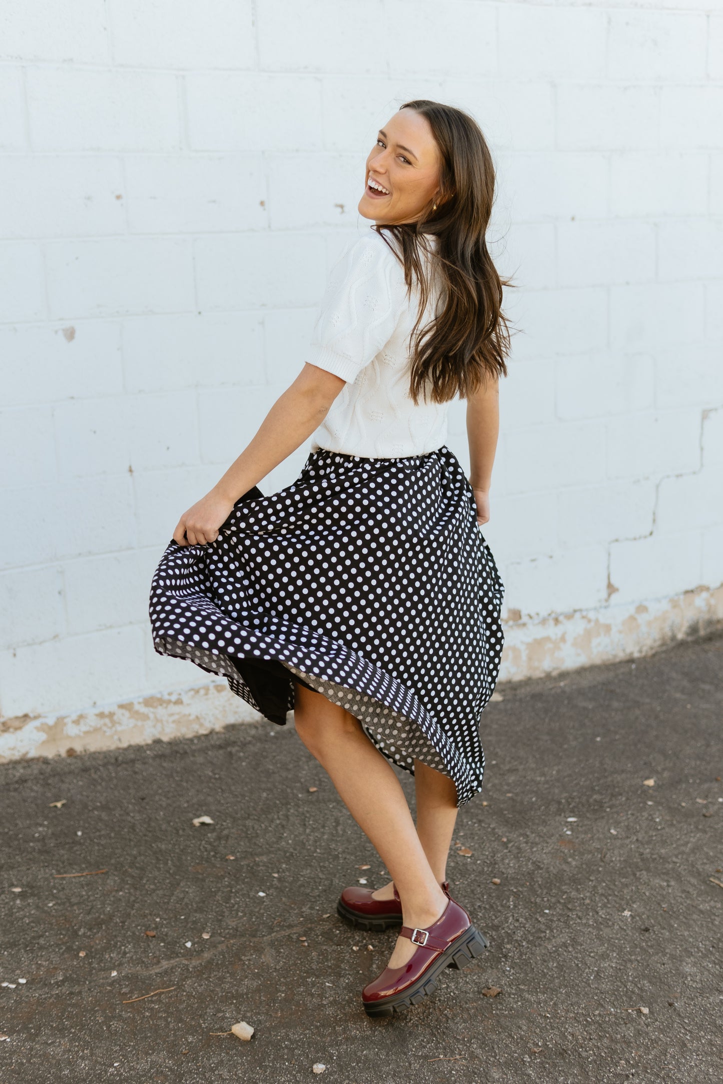 Polka dot skirt with black aplique flowers