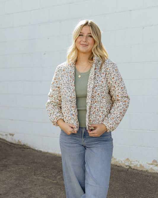 Puffer jacket in a light corduroy and a small floral print