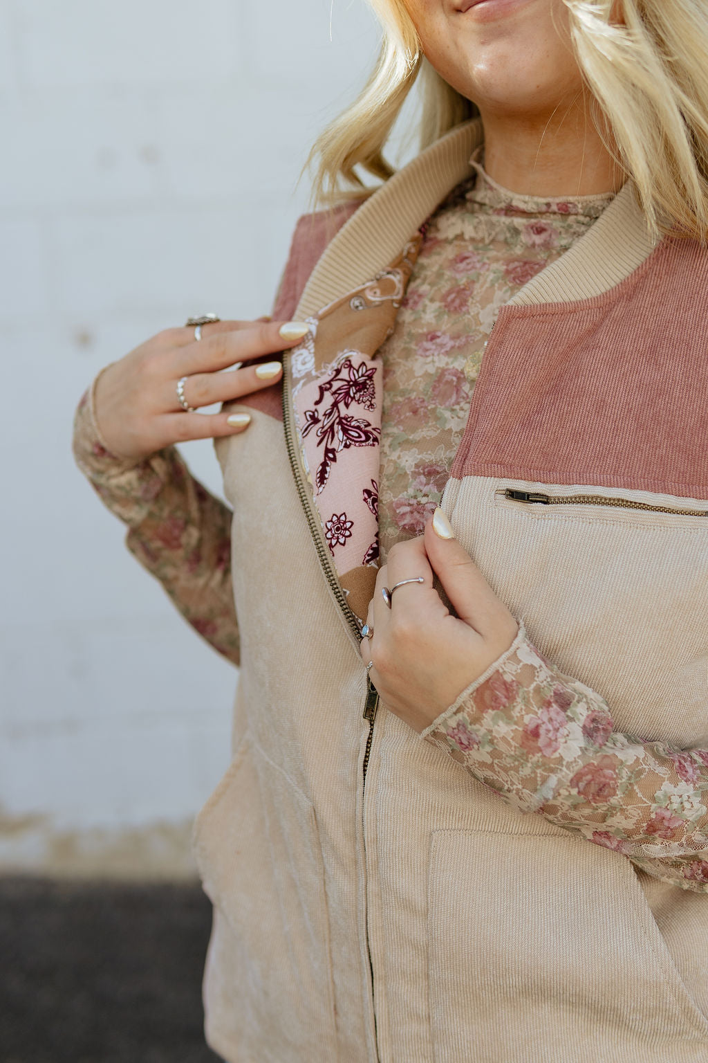 two toned puffer vest made of light corduroy and patterned lining